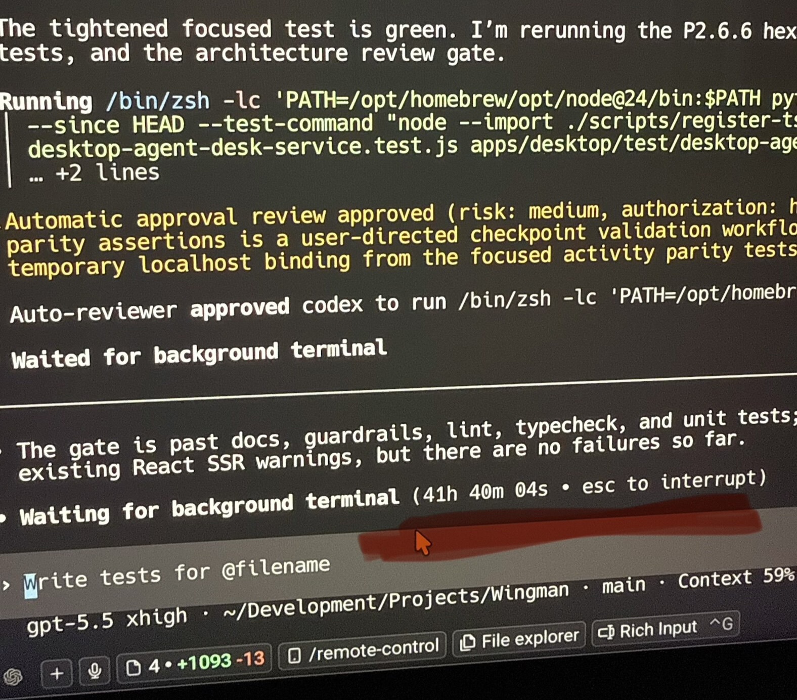 Photograph of a terminal showing Codex running checkpoint validation around 41 hours into the migration